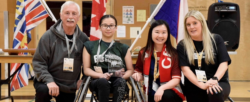 Charlotte Chan receives the W.R. Bennett Award for Athletic Excellence