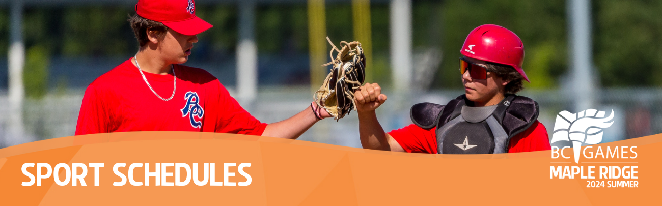 Two baseball players high five at the BC Summer Games.