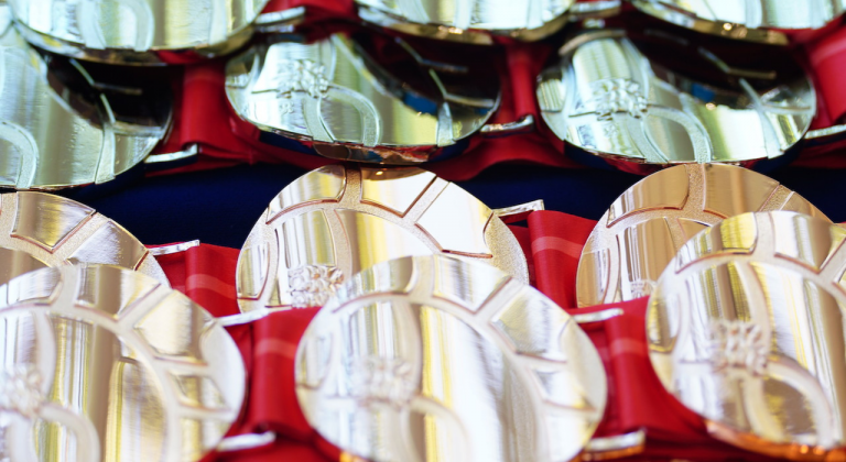 BC Games bronze and silver medals on a table